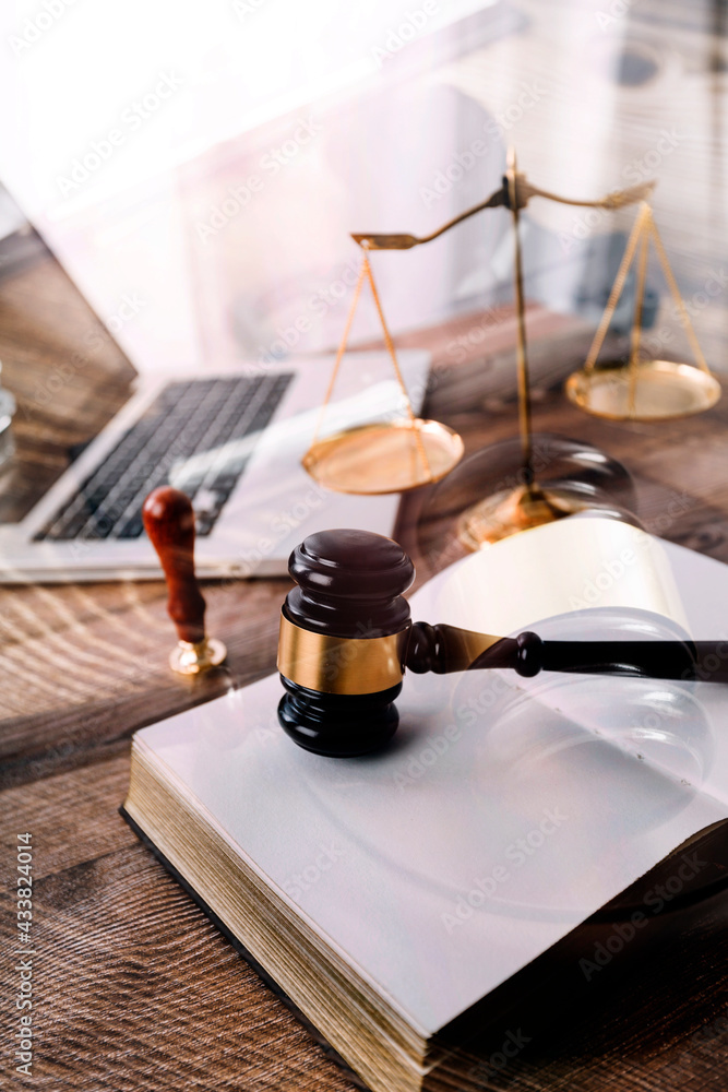 Obraz Business and lawyers discussing contract papers with brass scale on desk in office. Law, legal services, advice, justice and law concept picture with film grain effect