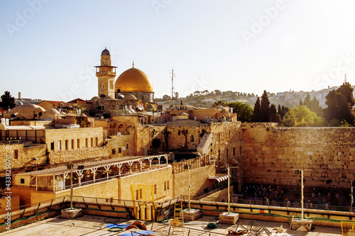 Western wall and the Bab al-Silsila Minaret and Dome of the Rock on a sunny day