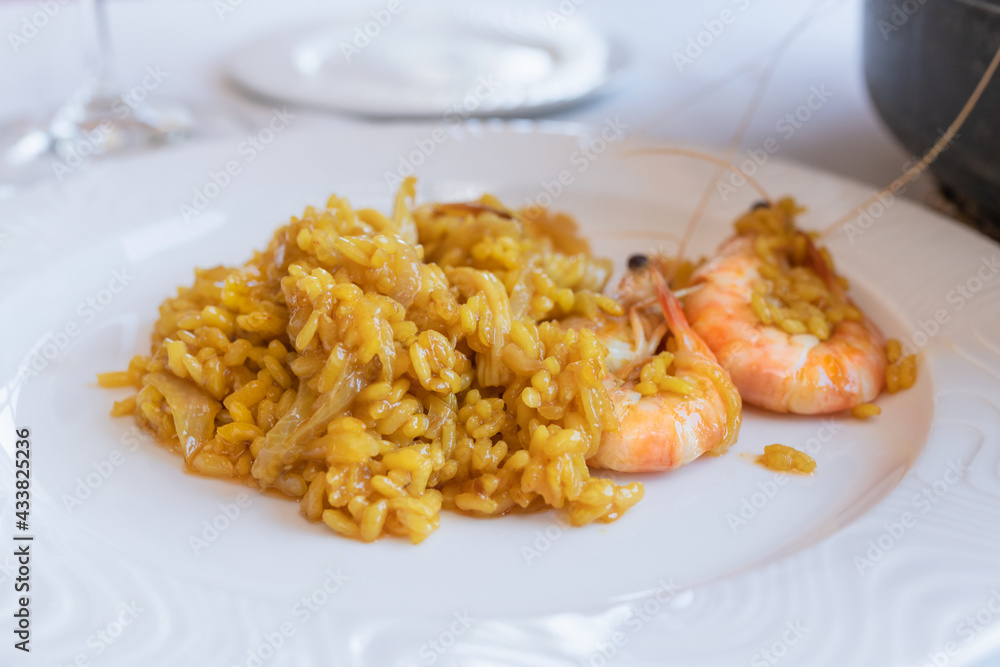 Close up of a plate of delicious rice with shrimps: Selective focus traditional food concept. Close up of a plate of delicious rice with shrimps: Selective focus traditional food concept.