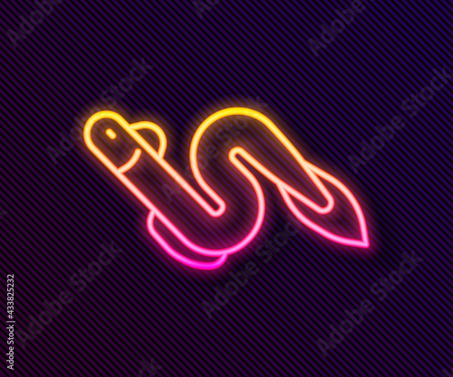 Glowing neon line Eel fish icon isolated on black background. Vector