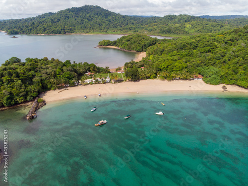 Aerial view of the beach washed by blue ocean water in Indonesia photo