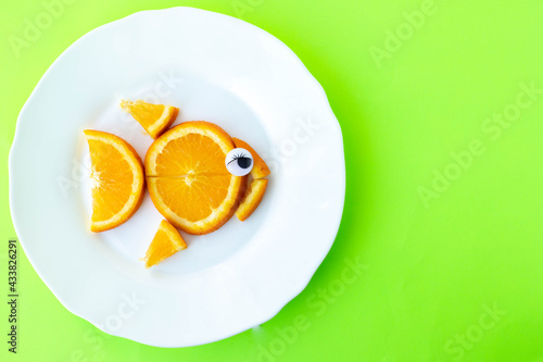  fish meal from orange slices photo