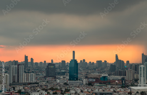 Bangkok, Thailand - May 09, 2021 : Aerial view of Beautiful scenery view of Skyscraper Evening time before Sunset creates relaxing feeling for the rest of the day. Selective focus.