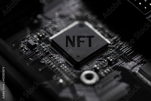 a dark computer cpu with an nft text composition