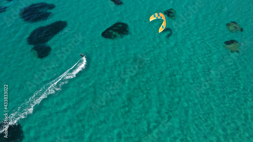 Fotografija Aerial drone photo of kite surfer practise in tropical exotic island bay with em