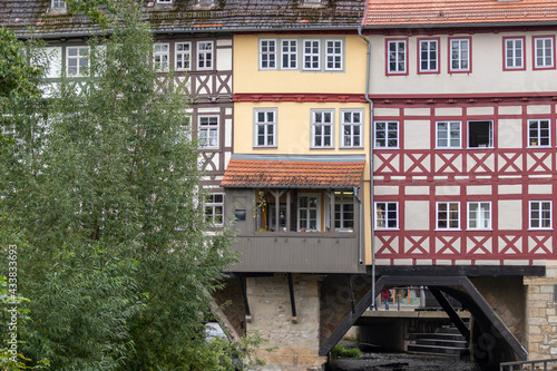 Facades of historic half-timbered houses on Krämerbrücke in Erfurt photo