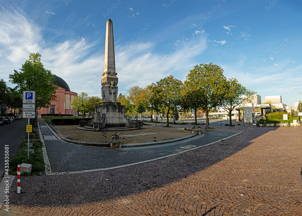 Fototapeta premium Picture of the alice monument and the dome church in the hessian university town Darmstadt in the federal state hesse