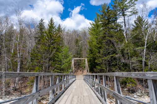 Wooden bridge over the pemigewasset river. Lincoln Woods Trail, White Mountains, New Hampshire,