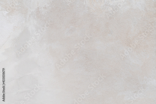 White and gray concrete wall is a decorative or textured surface. Can be used as a background or for design purposes