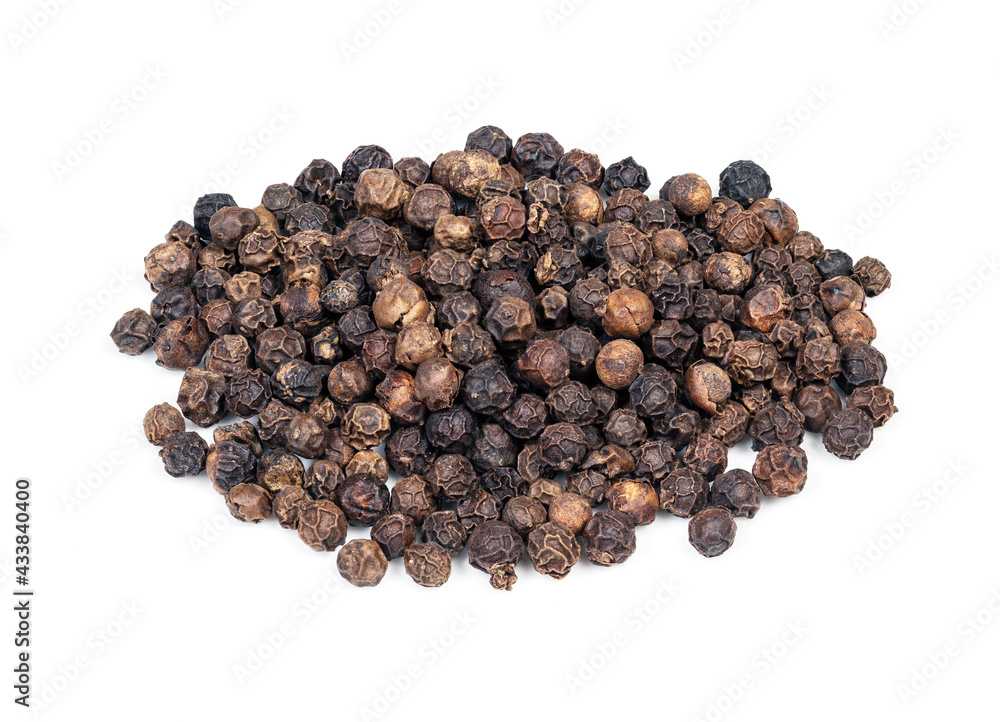 handful of hainan black pepper closeup on white handful of hainan black pepper closeup on white