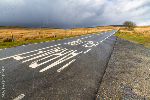 Wales road in open country. Exo triangle, the A543 road north of Pentrefoelas.
