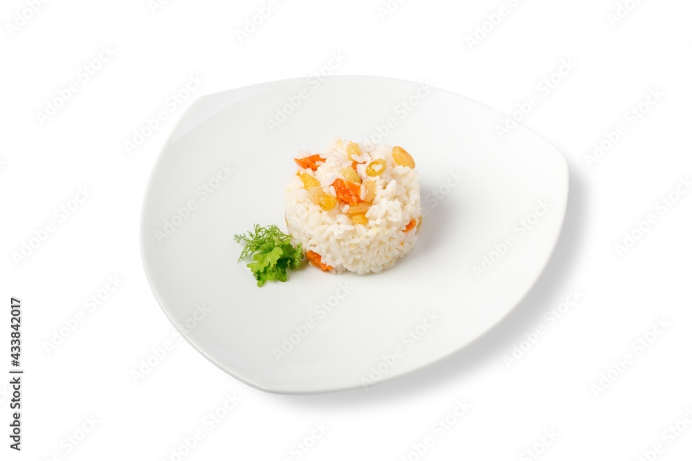 rice with vegetables and herbs for garnish. white plate and white background rice with vegetables and herbs for garnish. white plate and white background
