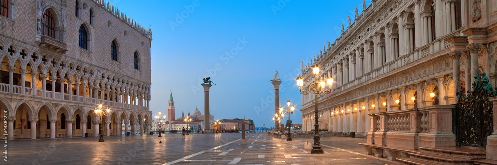 Banner, San Marco square at night, early morning. Venice or Venezia city, Italy, Europe. Panoramic composition, illuminated architecture, romantic street lights.