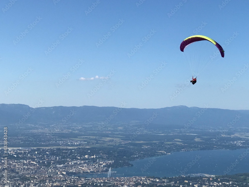 paraglider in the sky- lake Geneva paraglider in the sky- lake Geneva