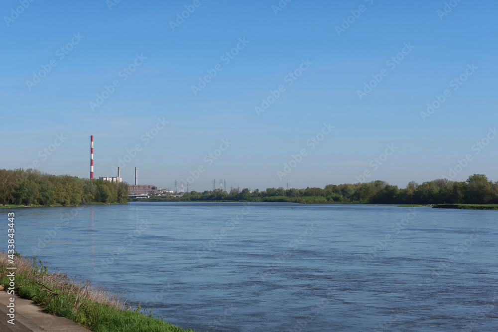 Warsaw, Poland. Vistula river and power plant Zeran in the distance