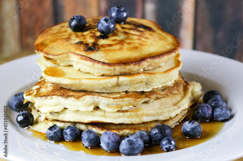 A Stack of Homemade Blueberry Pancakes with Real Maine Maple Syrup