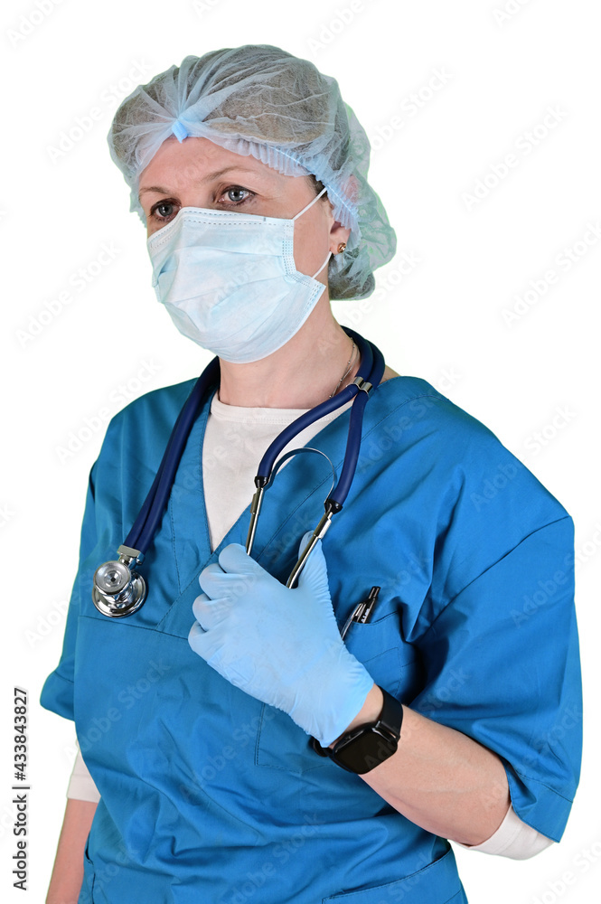 A female doctor in a blue medical suit, mask, cap and rubber gloves with a stethoscope around her neck A female doctor in a blue medical suit, mask, cap and rubber gloves with a stethoscope around her neck