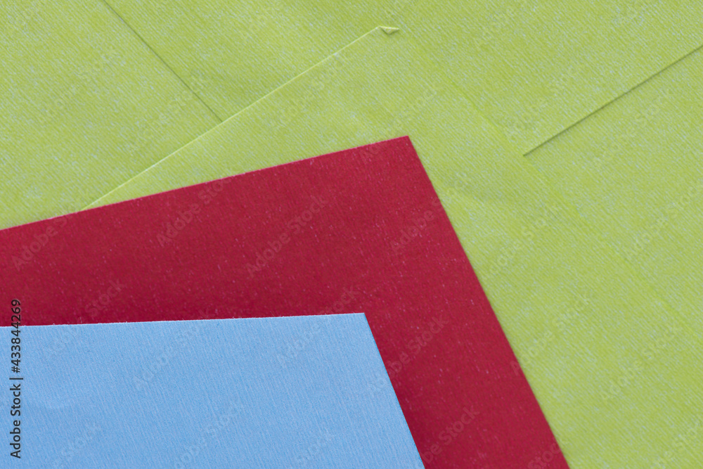green, red, and blue envelopes