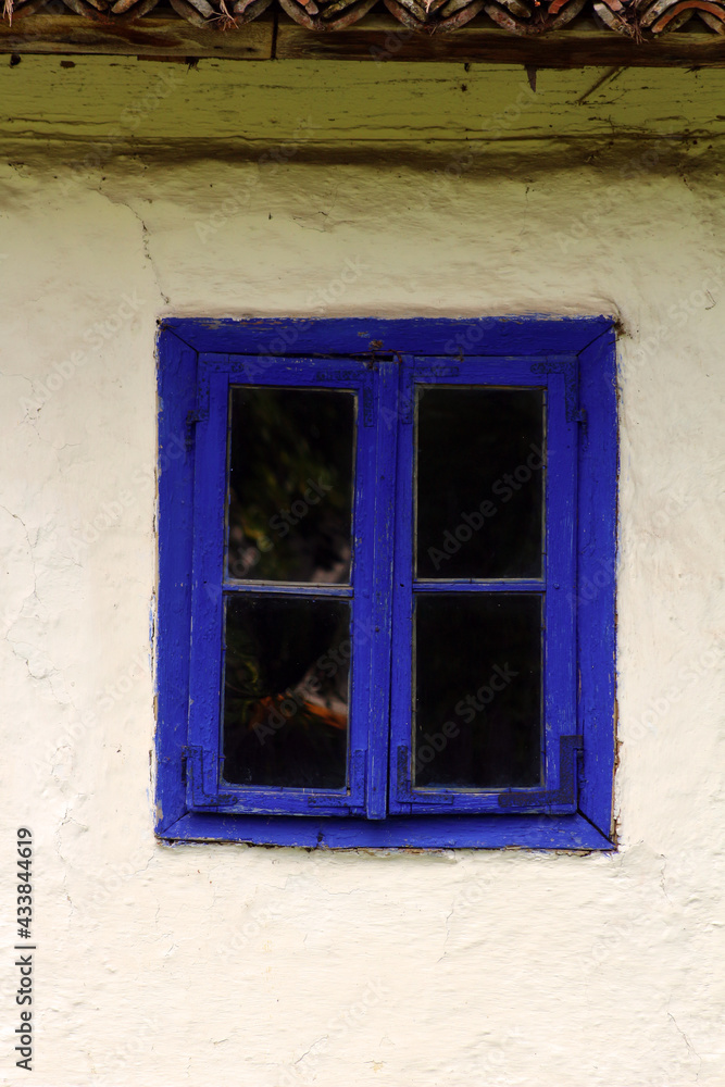 old window with shutters