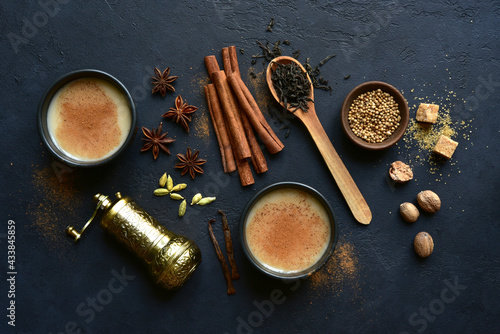 Traditional indian spicy tea masala with milk . Top view with copy space.