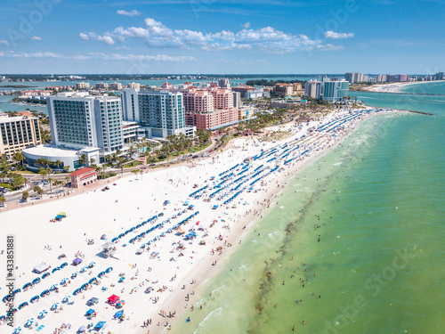 Summer vacations in Florida. Panorama of Ocean beach and Resorts in US. Blue-turquoise color of water. American Coast or shore. Island in Gulf of Mexico. Clearwater Beach FL. Aerial view on city © artiom.photo