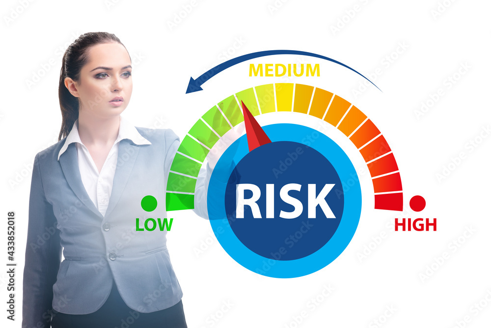 Businesswoman in risk metering and management concept Businesswoman in risk metering and management concept