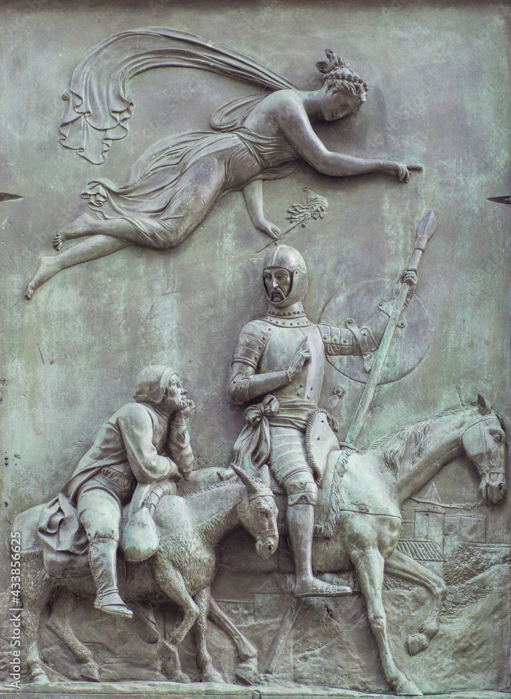 Don Quixote allegory. Don Quixote and Sancho Panza driven by the goddess of madness Don Quixote allegory. Don Quixote and Sancho Panza driven by the goddess of madness