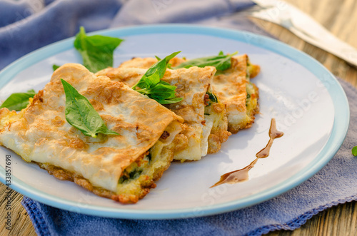 cottage cheese with spinach fried in pita bread