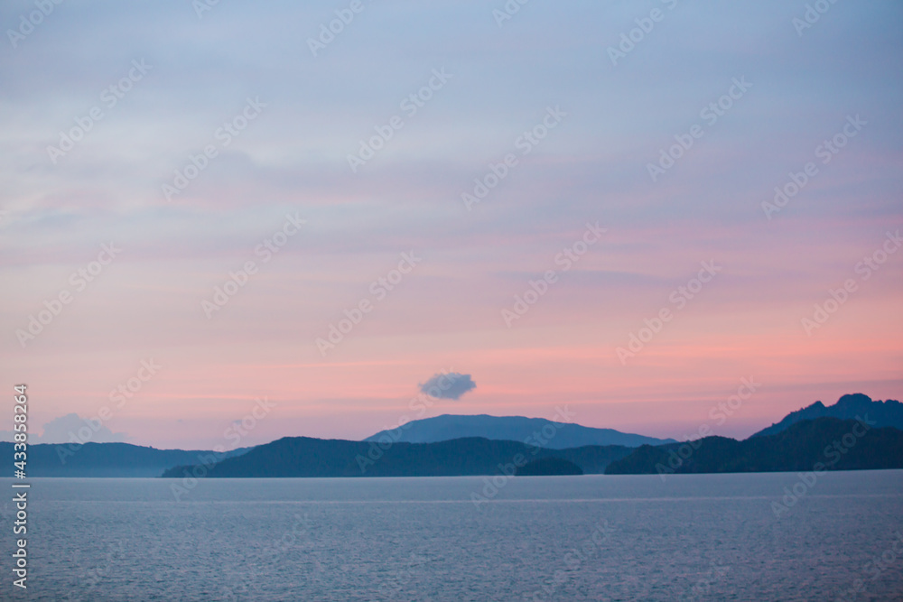 Scenic landscape view of island during sunset