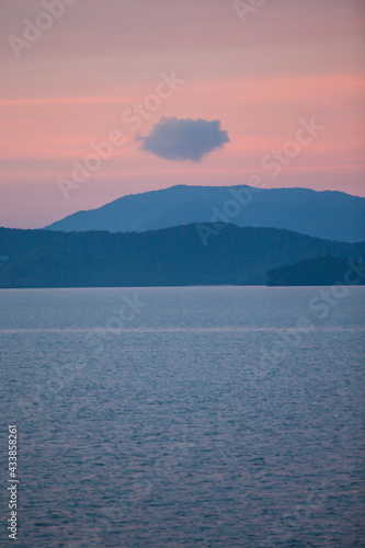Scenic landscape view of island during sunset