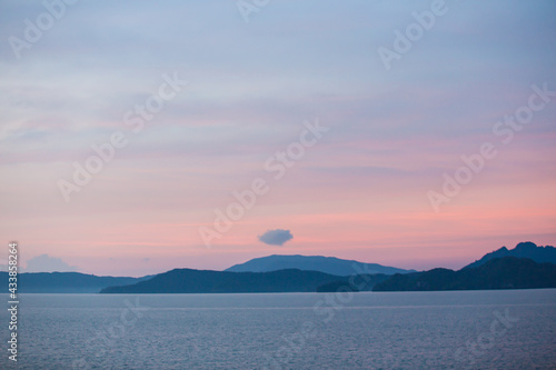 Scenic landscape view of island during sunset