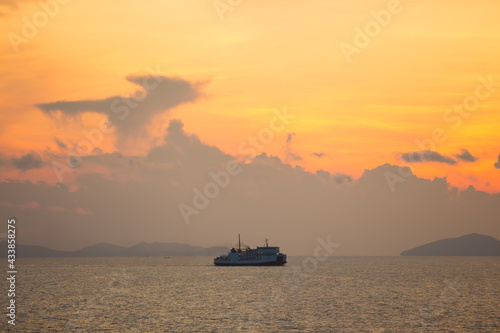 Scenic landscape view of island during sunset © Somprasong
