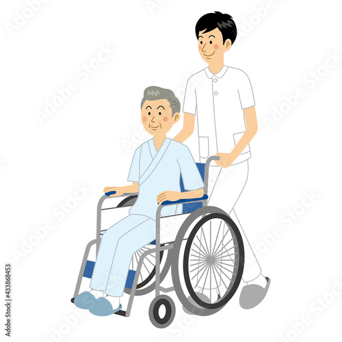 車いすを押す看護師