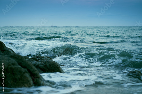 Beautiful waves of sea, light blue sea water color at Phayun Beach, Ban Chang, Rayong, Thailand.