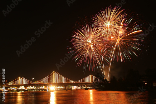 SURATTHANI  THAILAND - OCTOBER 17   Beautiful firework display for celebration on the Tapee river on parades in Chak Phra Festival on October 17  2015 in Suratthani  Thailand.