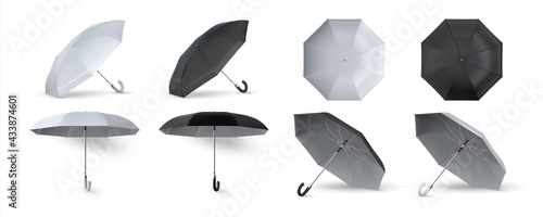 Realistic umbrella. 3D black and white opened parasols. Sunlight and rain protection. Isolated templates for branding. View from different sides on waterproof canopy. Vector accessories