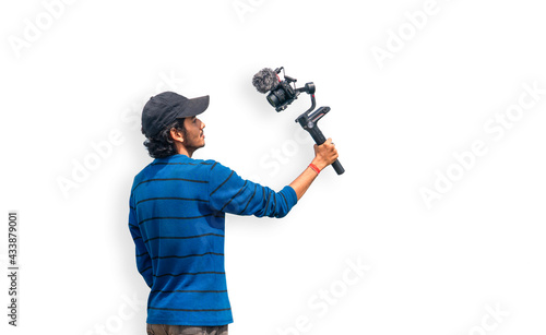 Canvas Print Young Asian blogger or vlogger looking at camera and talking