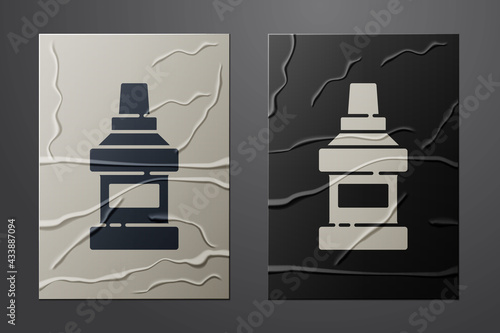 White Mouthwash plastic bottle icon isolated on crumpled paper background. Liquid for rinsing mouth. Oralcare equipment. Paper art style. Vector