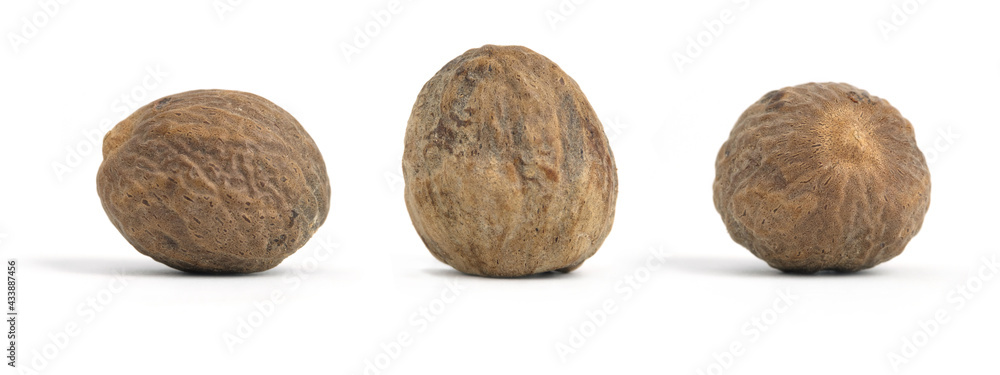 Closeup group set of nutmeg isolated on a white background Closeup group set of nutmeg isolated on a white background