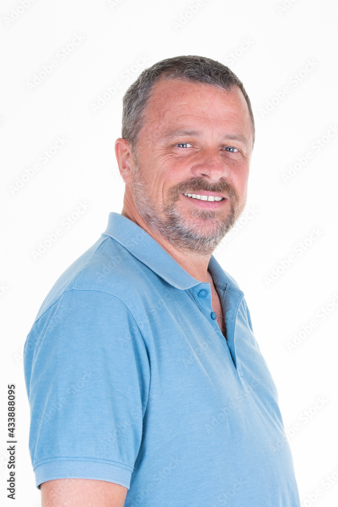 friendly face smiling middle aged handsome man in white background side view portrait friendly face smiling middle aged handsome man in white background side view portrait