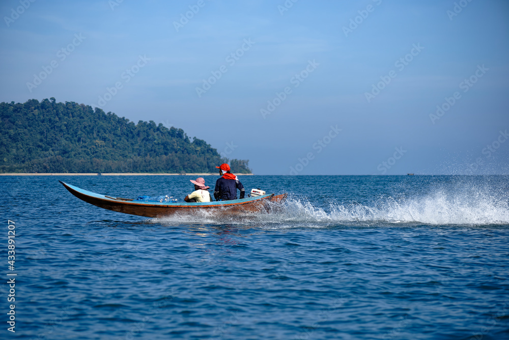 Fototapeta premium A Scenic view from Remote place in Thailand, Big mountain Landscape with tourist or local boat in Ocean 