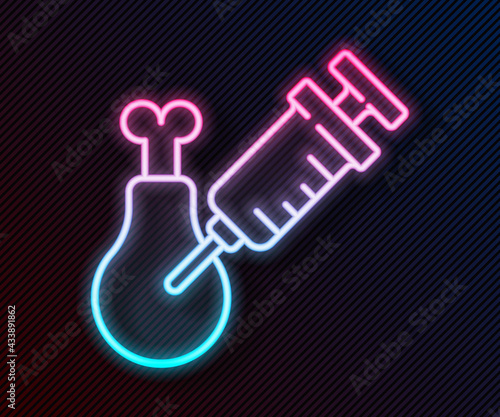 Glowing neon line Gmo research chicken icon isolated on black background. Syringe being injected to chicken. Vector