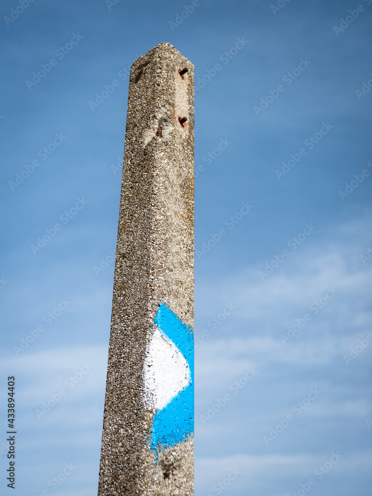 Post bollard of concrete with blue sky