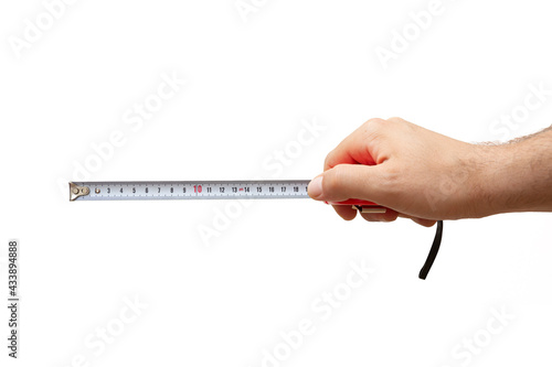 hand holding tape measure isolated on white