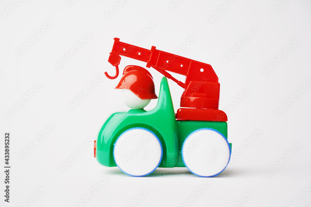 Colorful toy truck on a white background with copy space Colorful toy truck on a white background with copy space