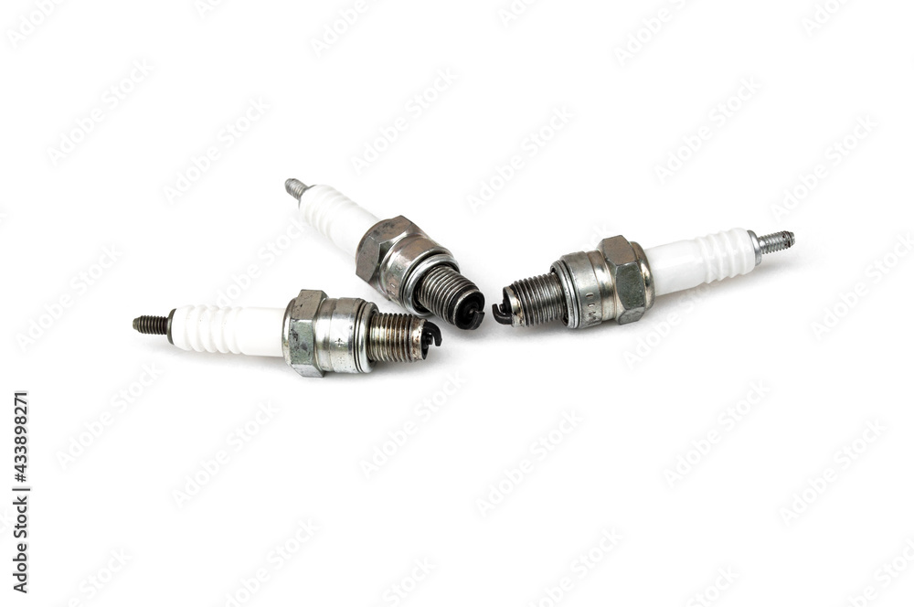 Old spark plug isolated on white background. Old spark plug isolated on white background.