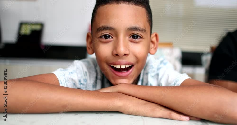 Brazilian little boy smiling spontaneously. Real life smile. Happy hispanic child Brazilian little boy smiling spontaneously. Real life smile. Happy hispanic child