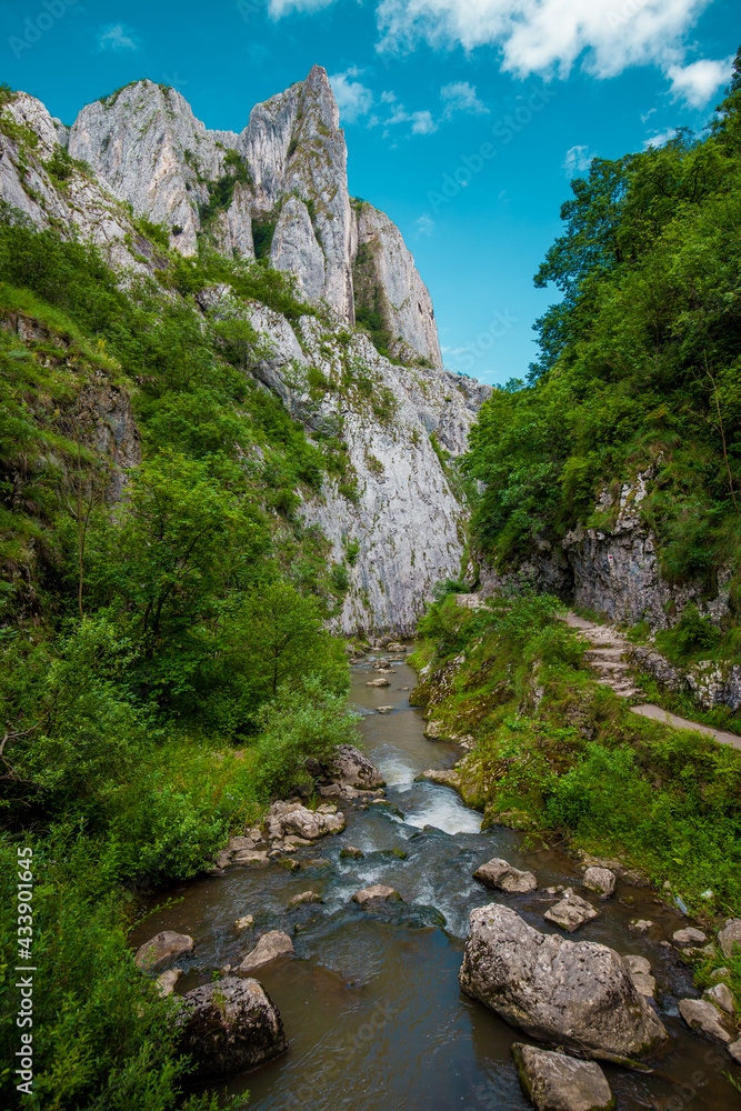 Cheile turzii canyon mountains with river crossing
