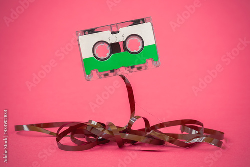 Audio cassette with pulled out tape
