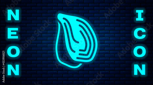 Glowing neon Mussel icon isolated on brick wall background. Fresh delicious seafood. Vector